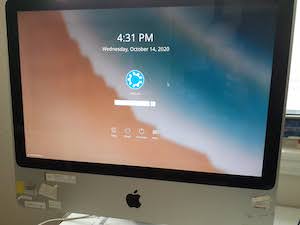picture of two thousand seven 20 inch iMac with kubuntu login screen displaying